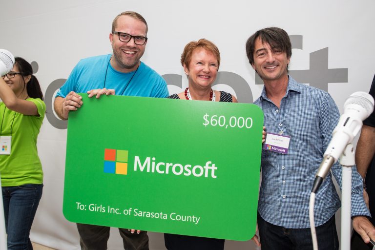 Local community organizations accepted nearly $1 million in technology grants from Microsoft at The Mall at University Town Center during the grand opening ceremony of the Microsoft Store in Sarasota, Fla., on June 11, 2015.