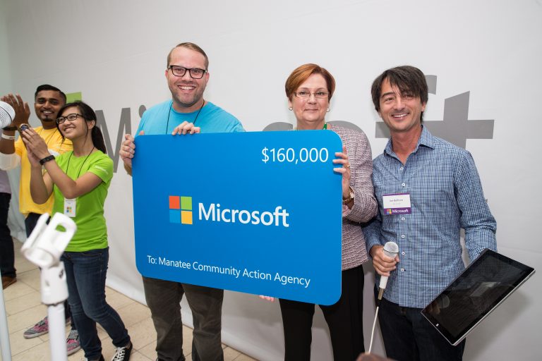 Local community organizations accepted nearly $1 million in technology grants from Microsoft at The Mall at University Town Center during the grand opening ceremony of the Microsoft Store in Sarasota, Fla., on June 11, 2015.