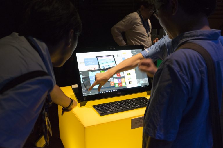 Fans experience the Start menu at the Windows 10 celebration in Tokyo.