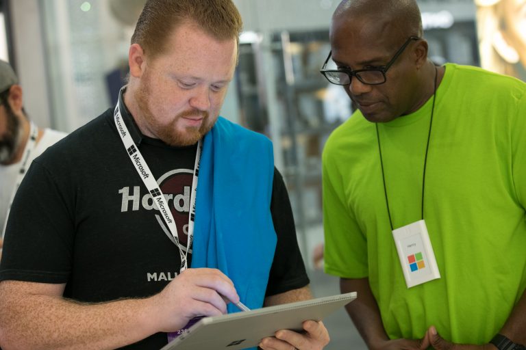 Customers engage with technology at the new Microsoft Store at Town Center at Boca Raton to celebrate the opening on Nov. 3, 2016 in Boca Raton, Fl.