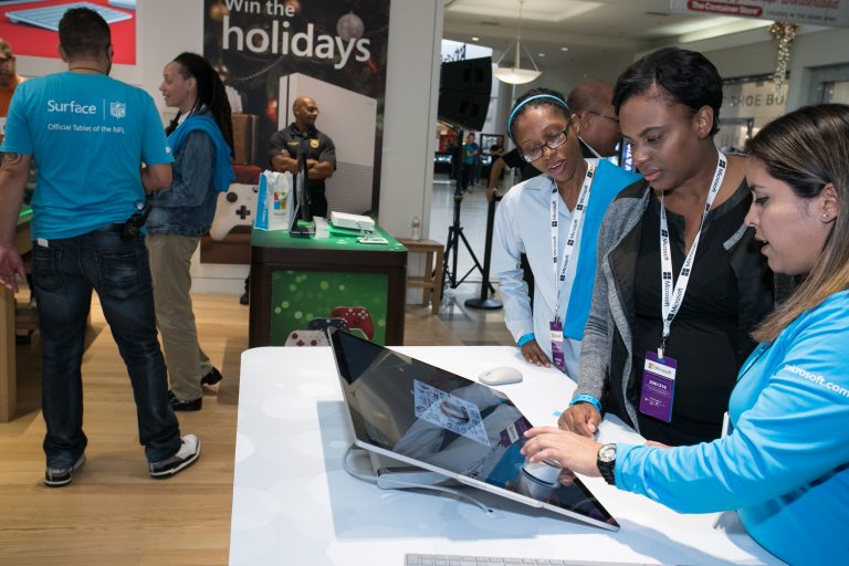 Customers try the new Microsoft Surface Studio at the Microsoft Store at Town Center at Boca Raton in Boca Raton, Fl., on Nov. 3, 2016.