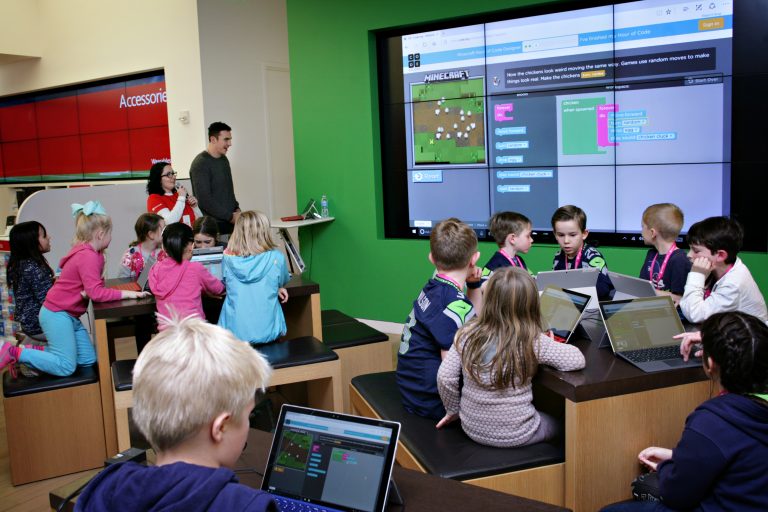 Seattle Seahawk Luke Willson joins the Microsoft Store at Bellevue Square Mall on Monday, Dec. 5, 2016, for a free Hour of Code workshop that teaches students how to code.