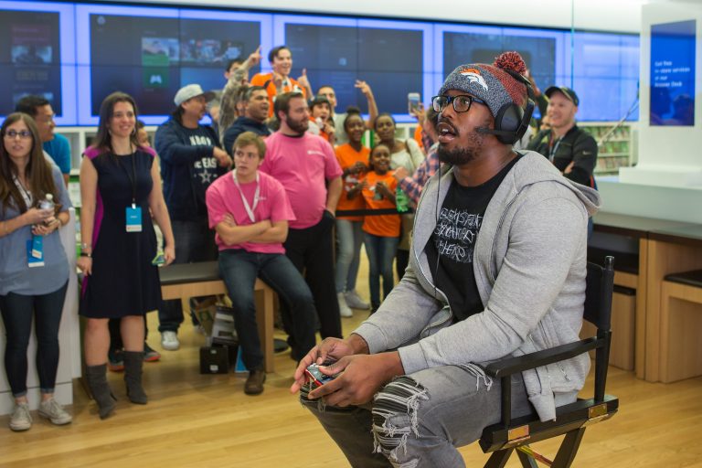 Excited fans gather to cheer on Denver Bronco Von Miller at the Microsoft Store at Park Meadows Mall (Lone Tree, Colo.) on Nov. 8, 2016.