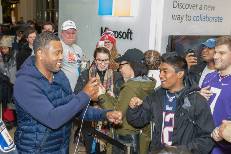 New England Patriot Legend, Lawyer Milloy with fans at the Microsoft Store at Prudential Center (Boston) on Feb. 3.