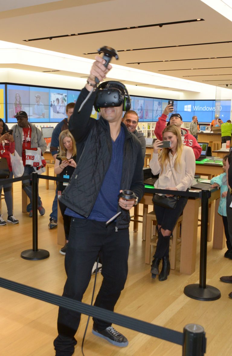 Retired Atlanta Falcon Legend, Tony Gonzalez, demos augmented reality with HTC Vive, powered by Windows 10, at the Microsoft Store at The Woodlands Mall (The Woodlands, Texas) on Feb. 4.