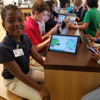 Students from Budewig Intermediate School learn how to develop app concepts with free classes and workshops offered year-round at the Microsoft Store at Houston Galleria (Houston).