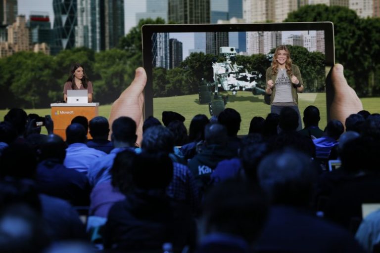 Amy Henson, left, and Megan Saunders of Microsoft 3D and mixed reality team announce View Mixed Reality at the Microsoft Education event at Center 415 on Tuesday, May 2, 2017, in New York. (Andrew Kelly/AP Images for Microsoft)