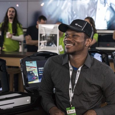An excited fan watches the Xbox E3 2017 Briefing at Microsoft Store at Westfield Century City in Los Angeles on Sunday, June 11, 2017.