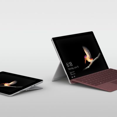 Two Surface Go tablets, one with keyboard attached