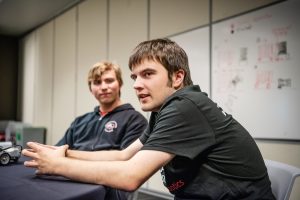 Photo of Einar Pedersen and Sam Hansen, two high school students who are on a Unified Robotics team together.