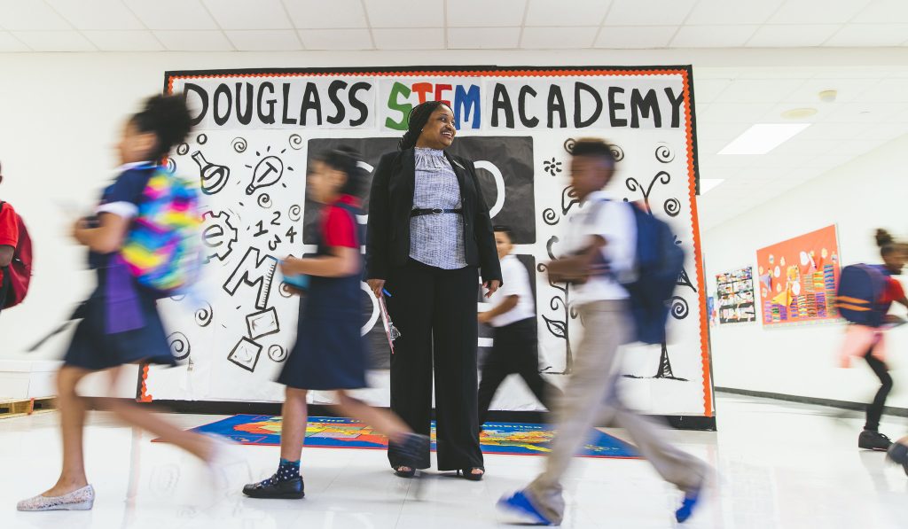 Frederick Douglass school prinicpal and students