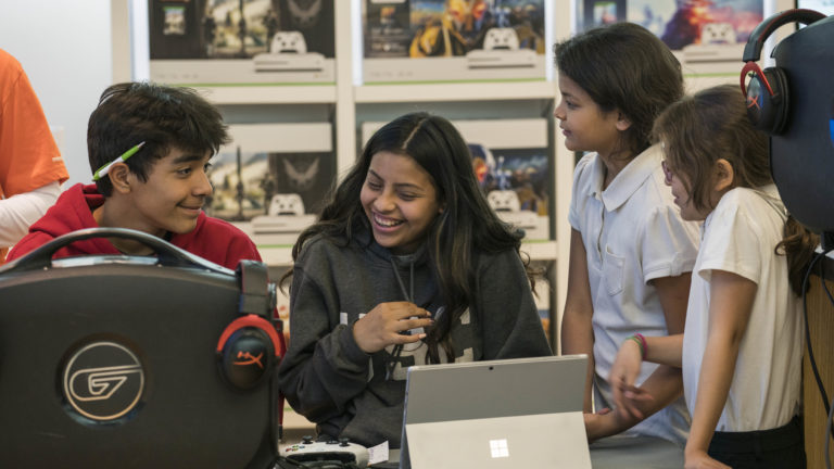 Students explore life skills and practice healthy habits as they participate in Rocket League and Fortnite tournaments during a free Microsoft Store Summer Camp.