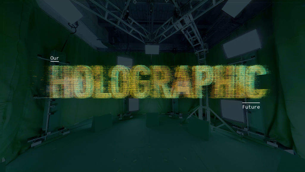 Our holographic world spelled out in front of a photo of the mixed reality capture studio