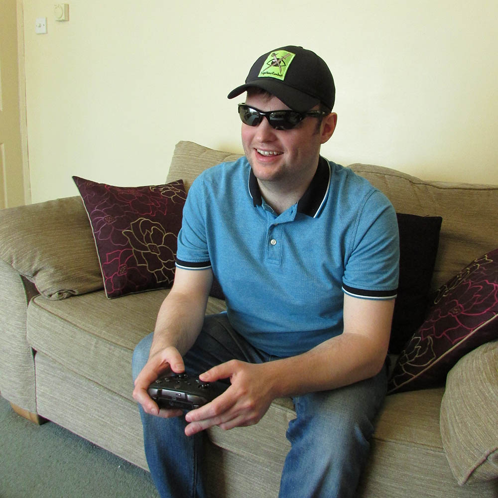 Sightless Kombat playing a video game