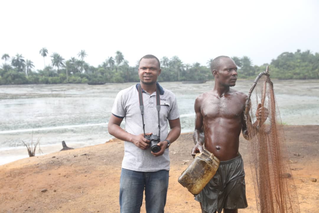 Kelechukwu Iruoma with a fisherman