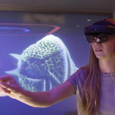 Woman wearing HoloLens device