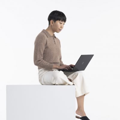 Woman using a Surface Laptop 4