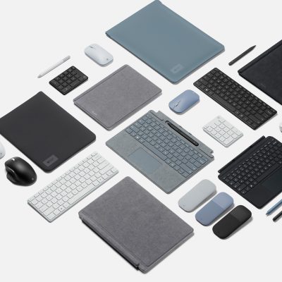 An aerial view of Surface Pro 8 devices with accessories