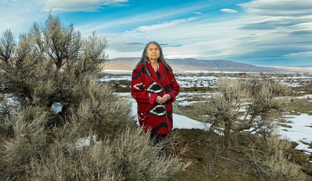 Patsy Whitefoot stands in field