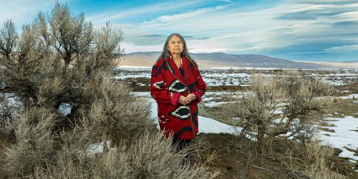 Patsy Whitefoot stands in field