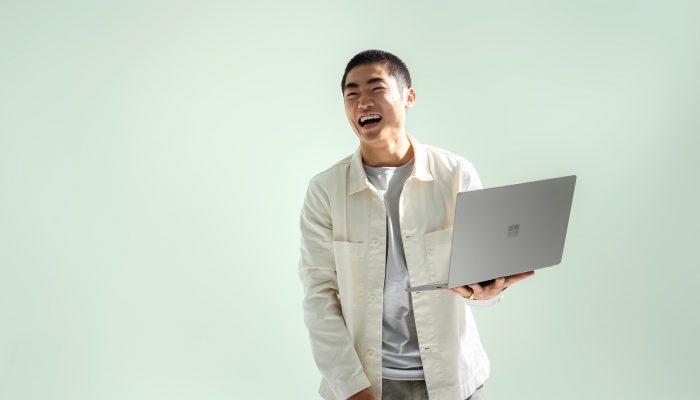 Man holding Surface Laptop Go 2
