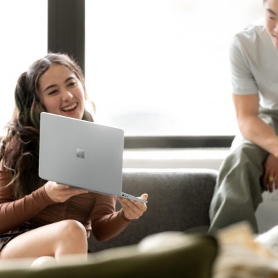 Woman holding Surface Laptop Go 2