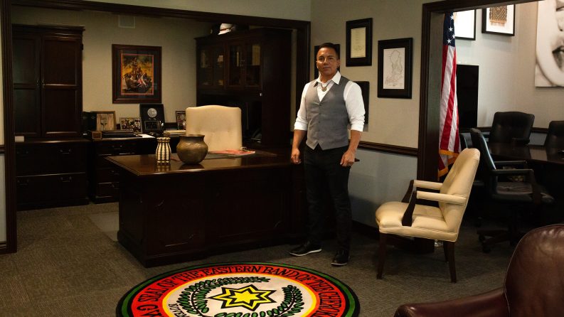 Richard Sneed, principal chief of the Eastern Band of Cherokee Indians, standing in his office