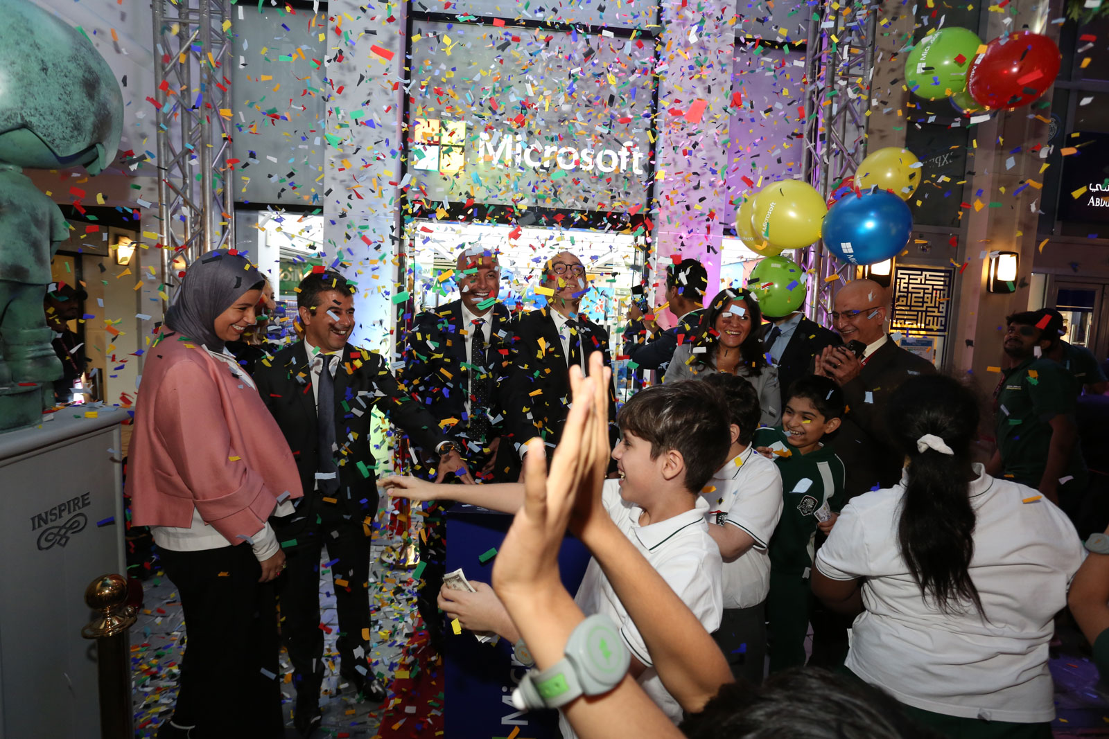 Facilitators at Microsoft’s Innovation Laboratory celebrating its successful launch with kids.