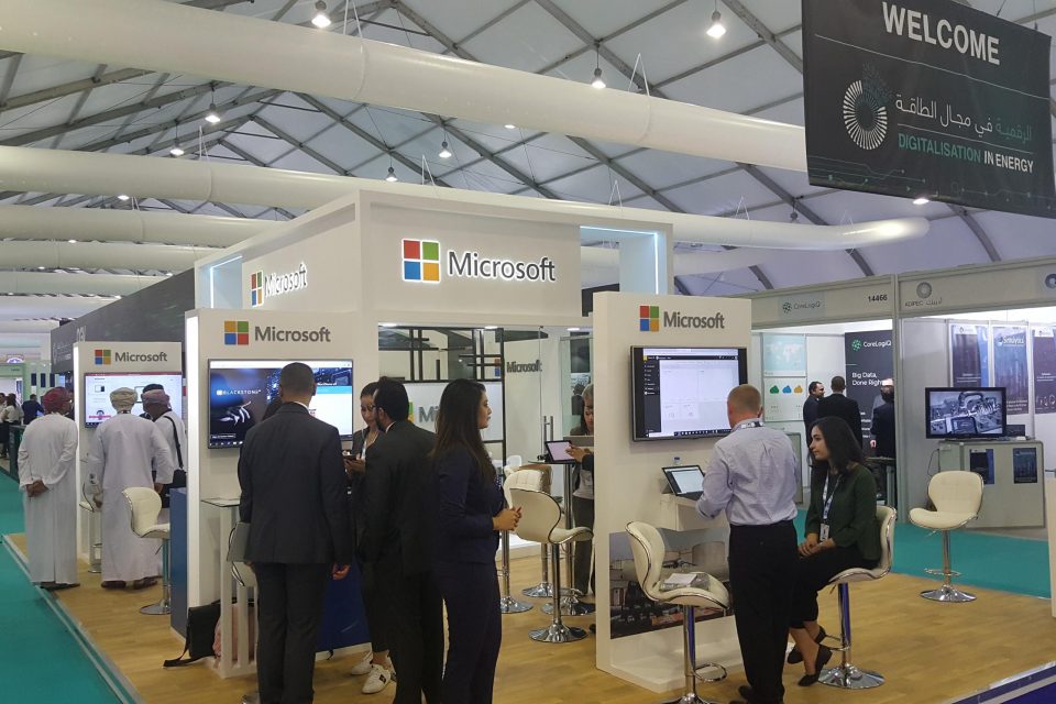 Microsoft stall at the exhibit with visitors passing by