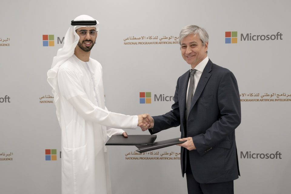 Official photo of HE AI Minister Omar Sultan Al Olama and Jean-Philippe Courtois of Microsoft after signing the MOU