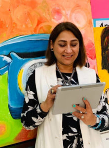 Dubai art teacher using Microsoft Surface Pro device