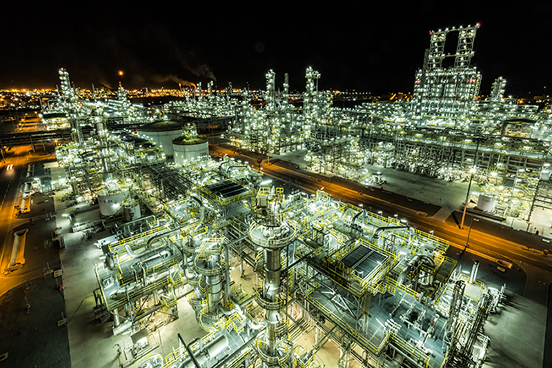 Aerial image of a refinery during the night.