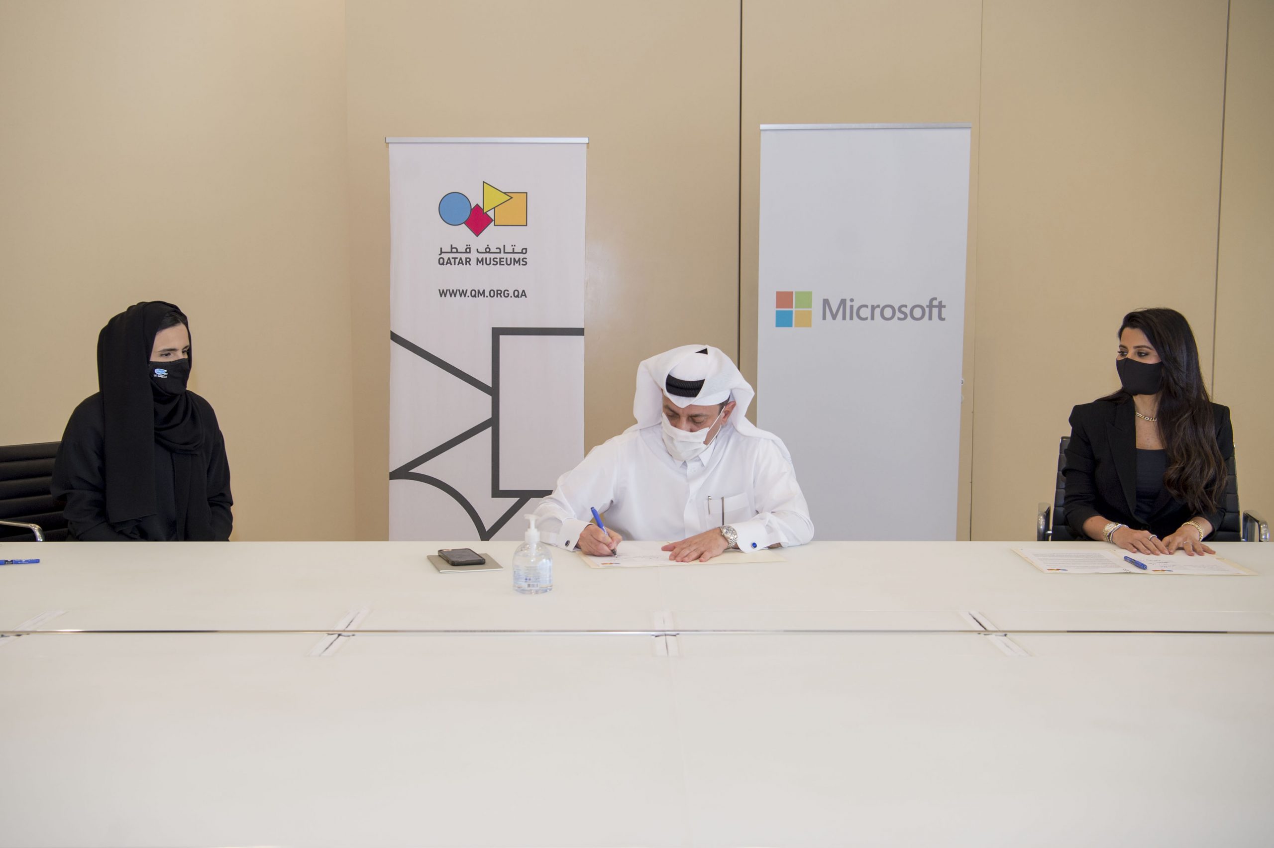  A picture of spokespersons from Microsoft and Qatar Museums during signing the agreement 