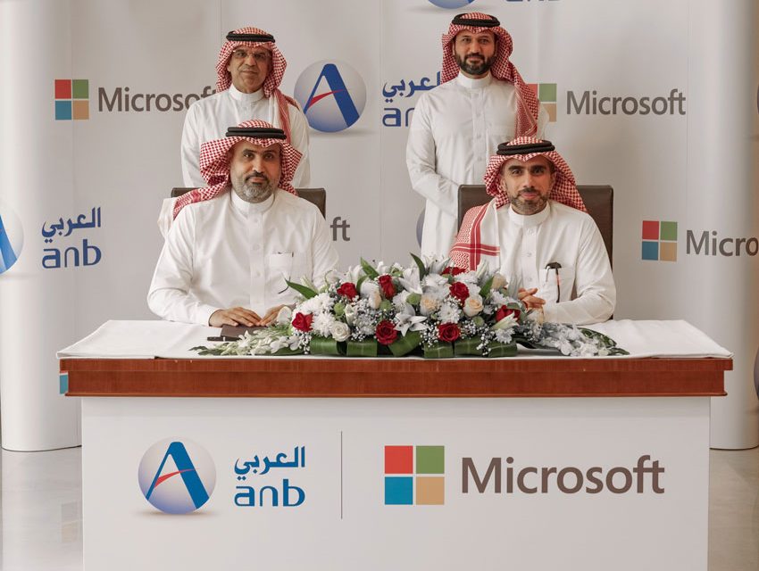 A picture of signing the ceramoneybetweenMicrosft and Arab National Bank