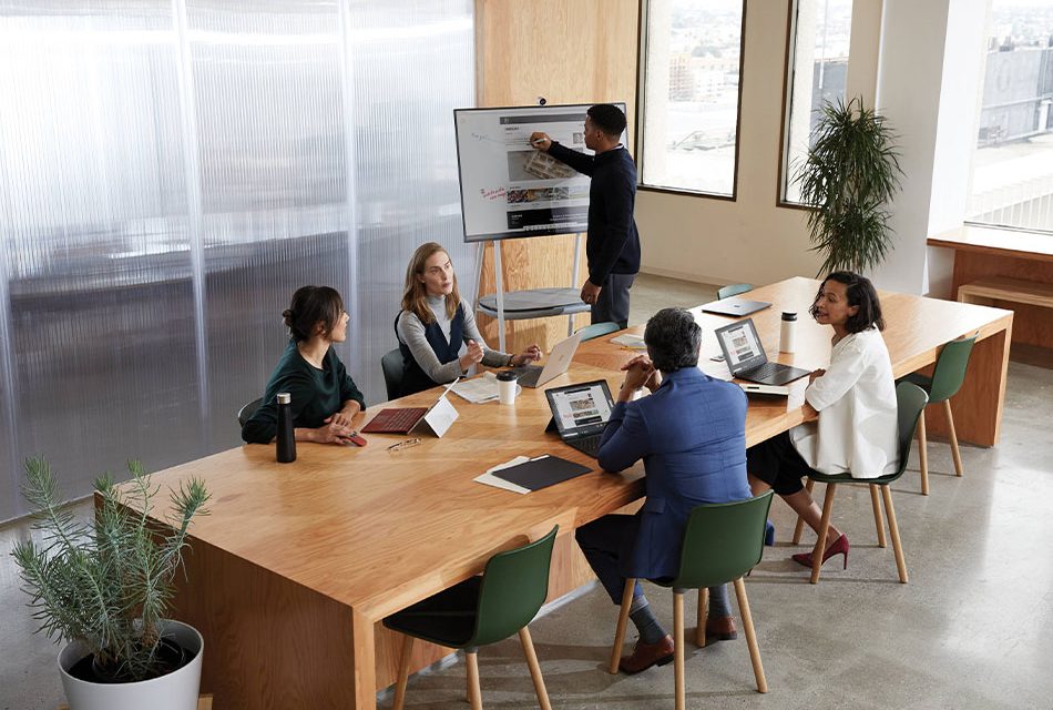 HR focus team members collaborating in boardroom