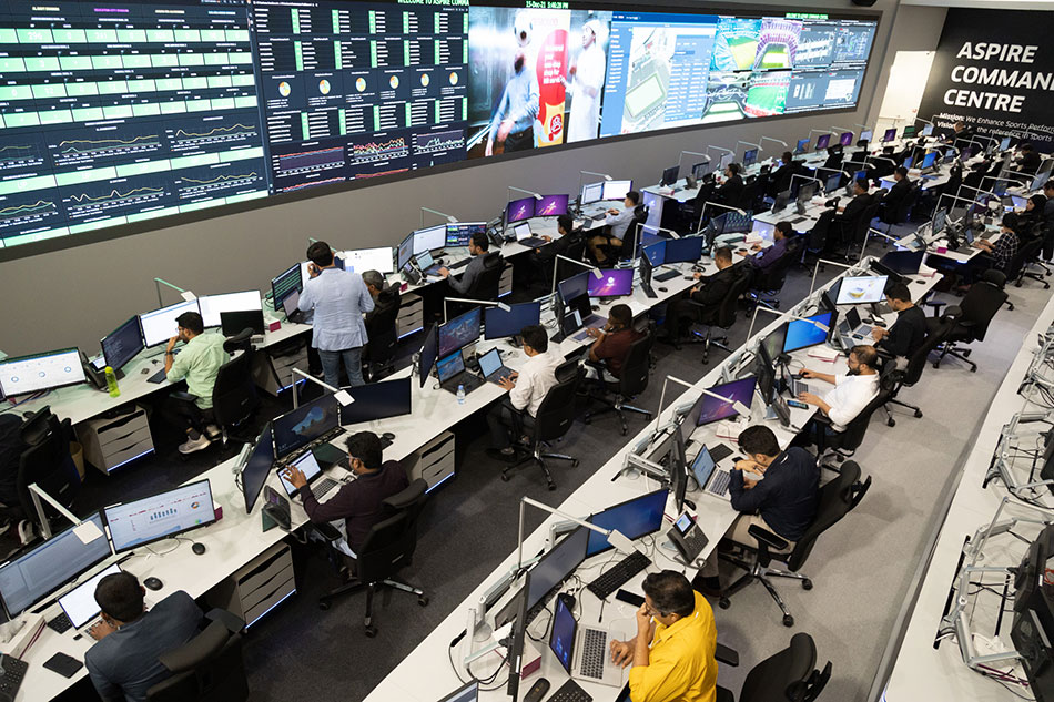 A team of experts analyse data from the Aspire Command Center.