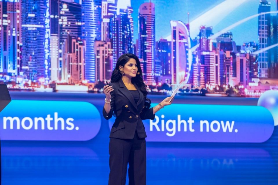 A women speaking on stage