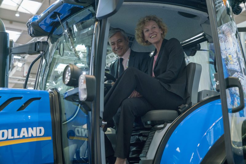 Jean-Philippe Courtois, EVP and President, Microsoft Global Sales, Marketing & Operations, and Sabine Bendiek, Area Vice President, Microsoft Germany, in the cab of CNHi's T7 Tractor.