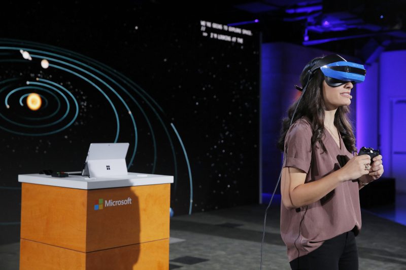 Amy Henson from Microsoft mixed reality team demonstrates holographic experiences for the classroom at the Microsoft Education event at Center 415 on Tuesday, May 2, 2017, in New York. (Andrew Kelly/AP Images for Microsoft)