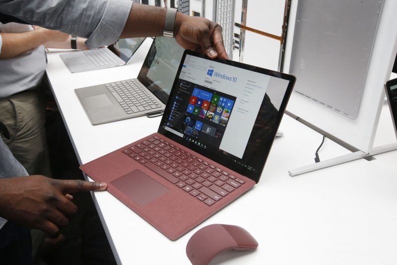 A fan tests out the new Surface Laptop device while displayed at the Microsoft Education event at Center 415 on Tuesday, May 2, 2017, in New York. (Jason DeCrow/AP Images for Microsoft)
