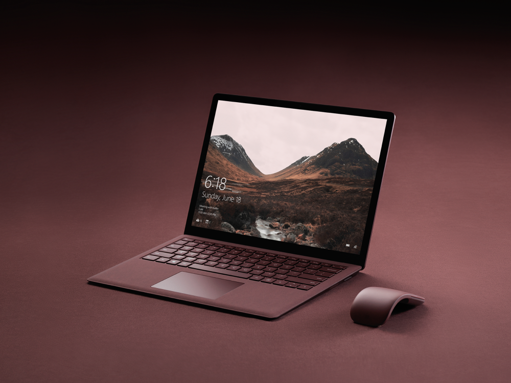 Surface Laptop and Microsoft Surface Arc Mouse in Burgundy