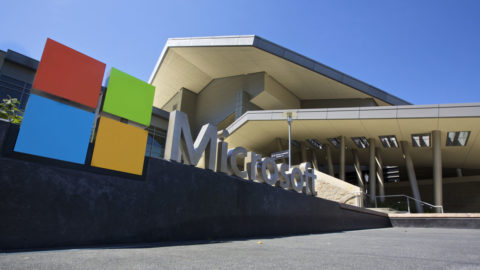Large Microsoft logo outside visitor center building