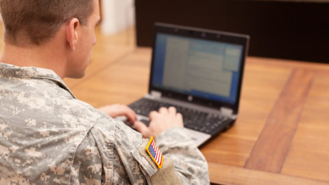 soldier with laptop