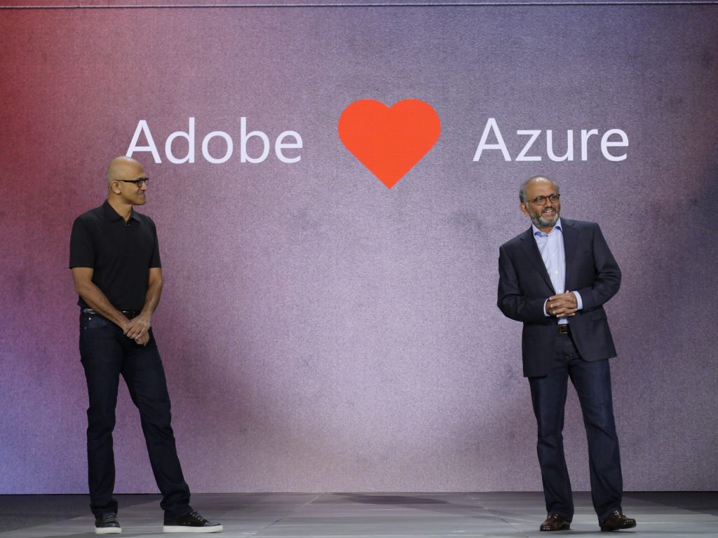 Microsoft CEO Satya Nadella and Adobe CEO Shantanu Narayen on stage at Microsoft Ignite.
