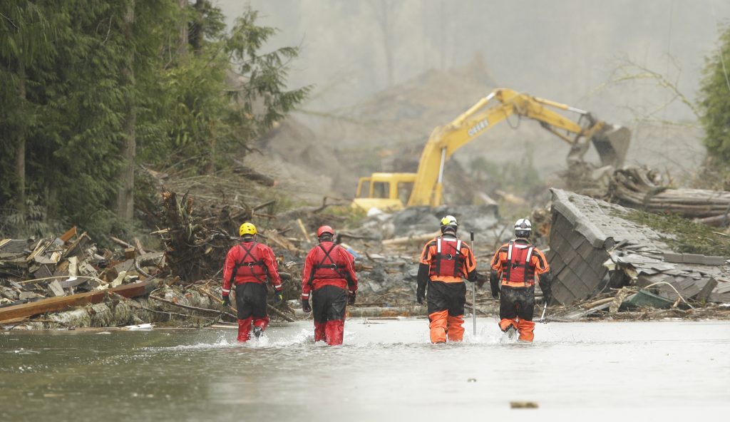 Search and rescue teams continue to work on March 27, 2014 in Oso, Washington. (Photo by Ted S. Warren-Pool/Getty Images)