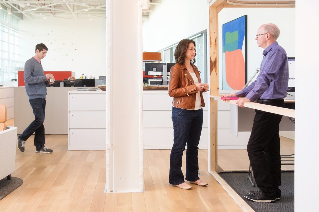 Steelcase CEO Jim Keane stands in an early iteration of his personalized office.