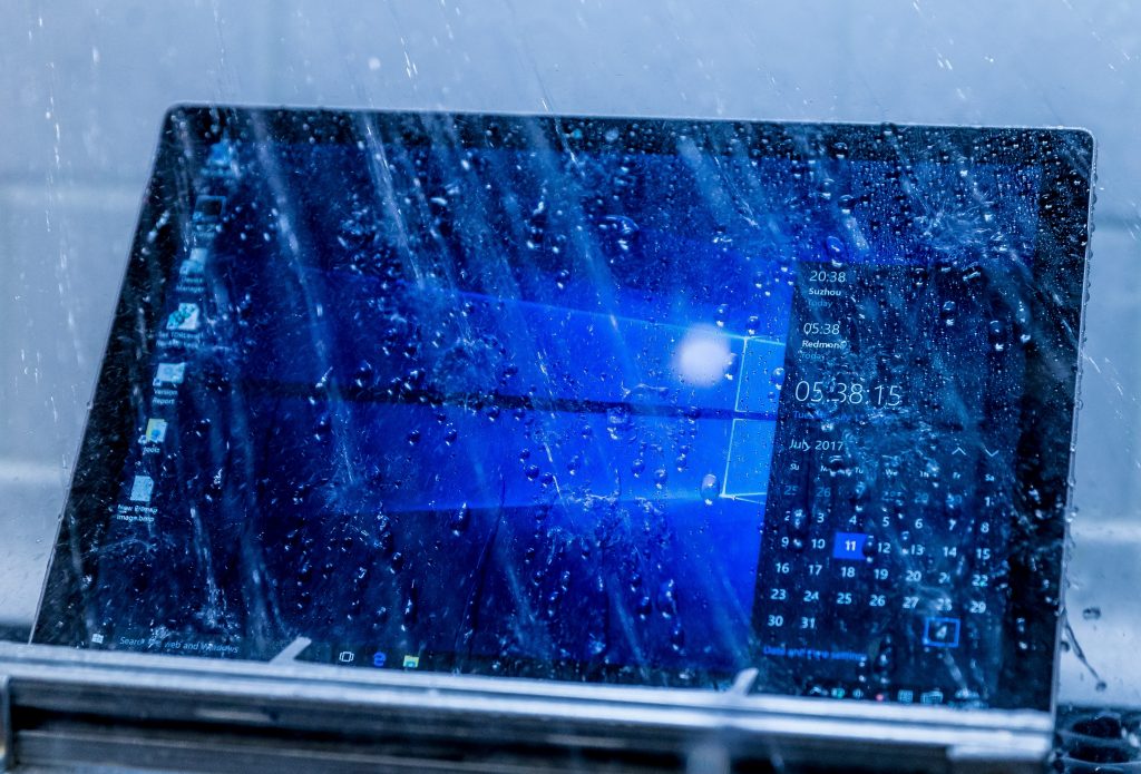 A Microsoft Surface device undergoes a water test.