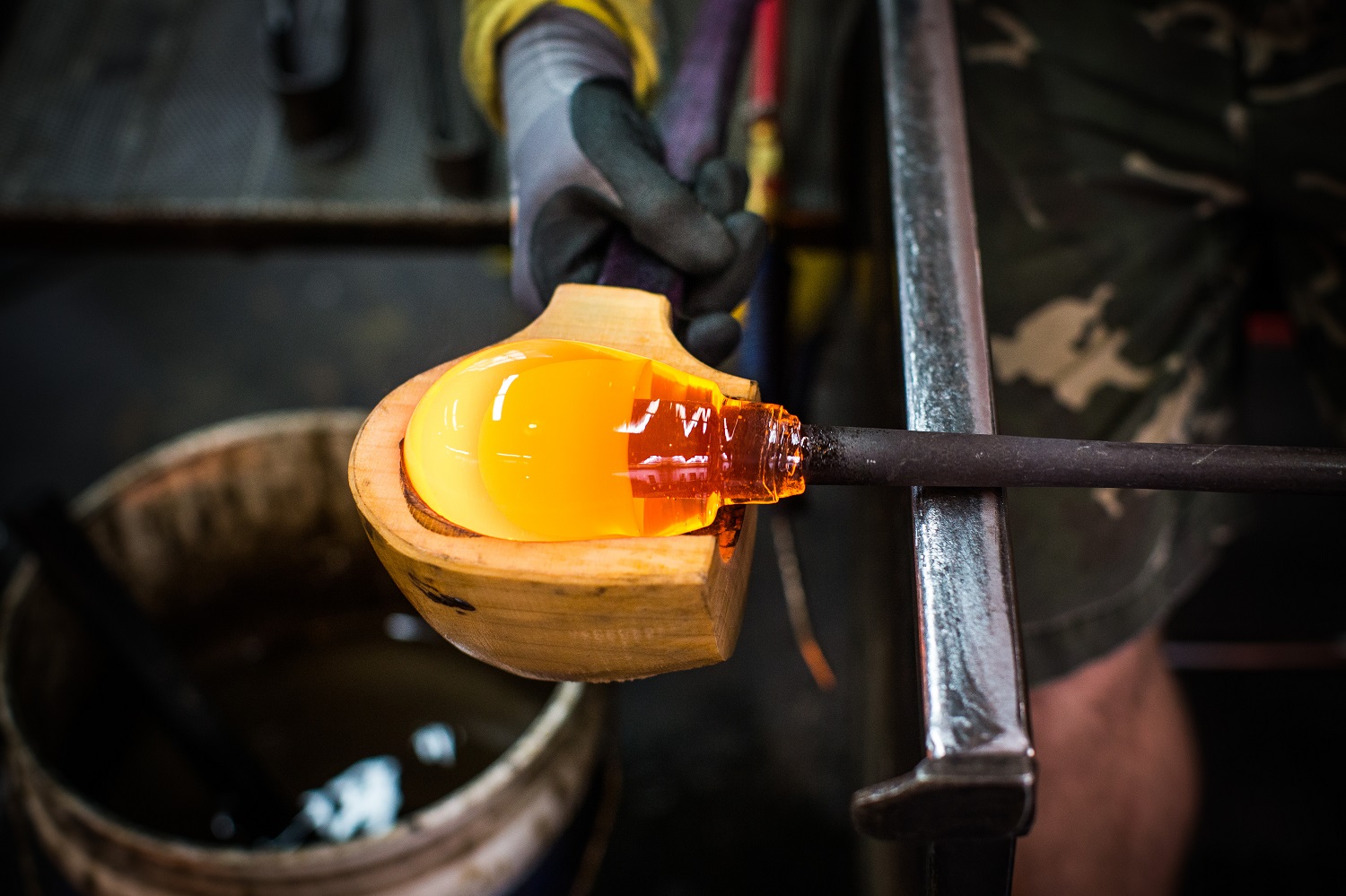Molten glass as its shaped into a handblown glass product