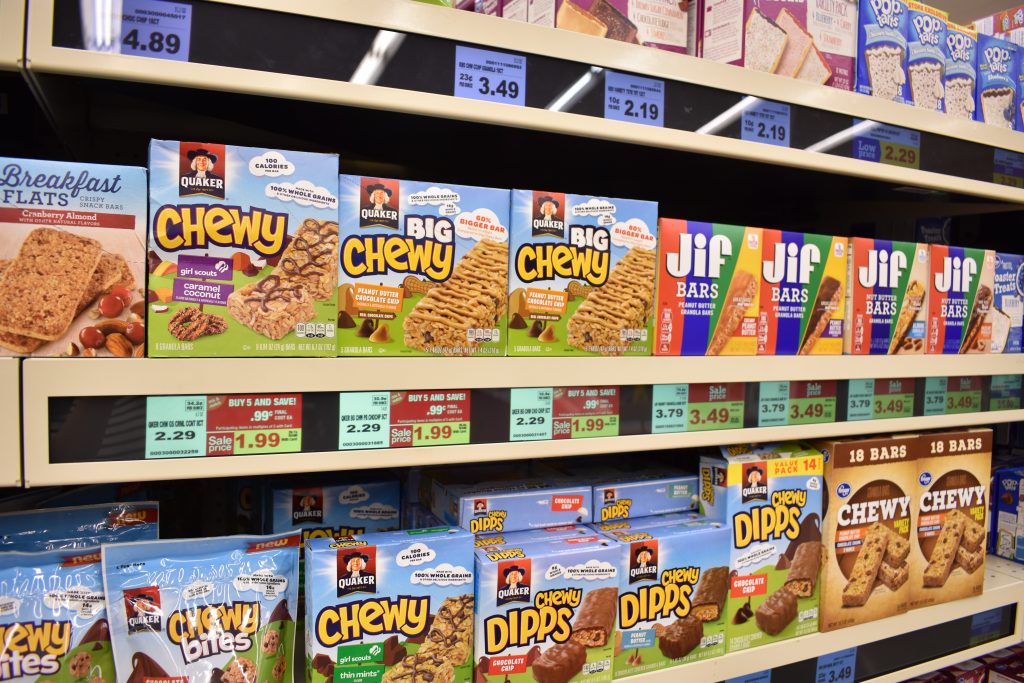 Kroger EDGE shelves containing boxes of cereal bars.