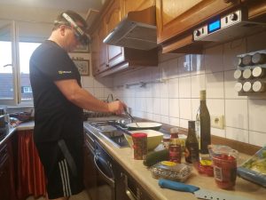 Tossed salad and mixed reality: Bauch cooks in his kitchen while wearing HoloLens. .